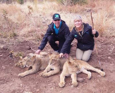 Dr. Philip Claussen and Nancy Claussen with Cubs