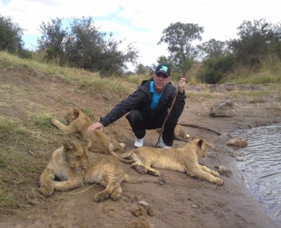 Oak Brook Chiropractor Dr. Philip Claussenwith 3 cubs